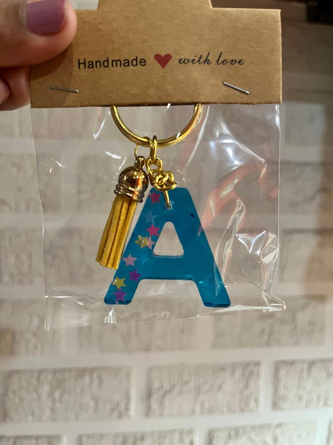 Blue star A keyring with gold tassel
