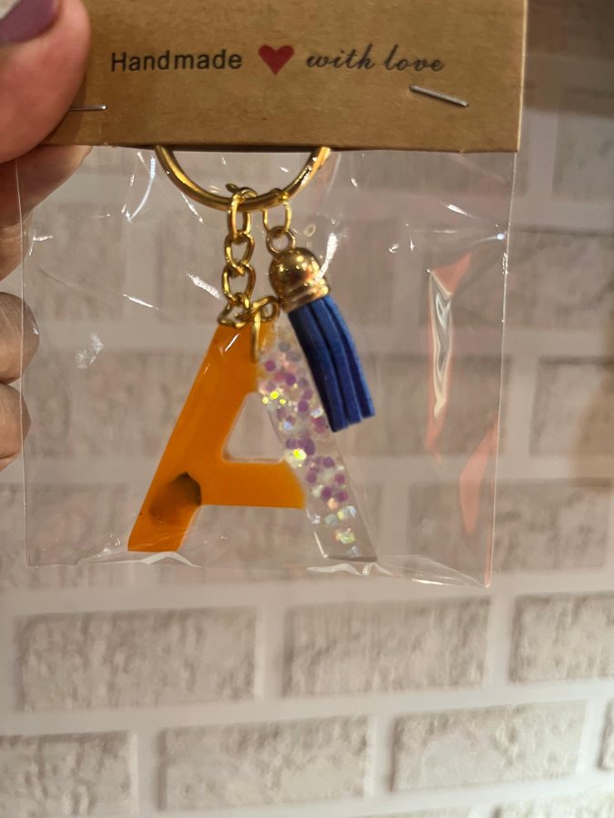 Orange glitter resin keyring pair